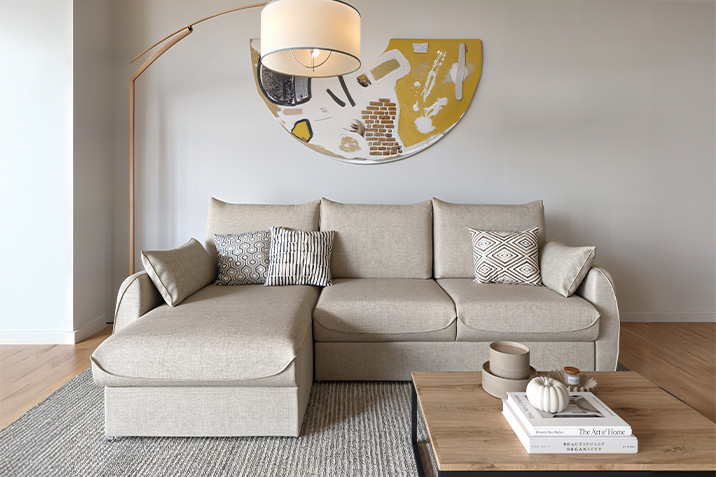 Corner sofa in beige tones with a chaise lounge and modern decor, by CenterHome.