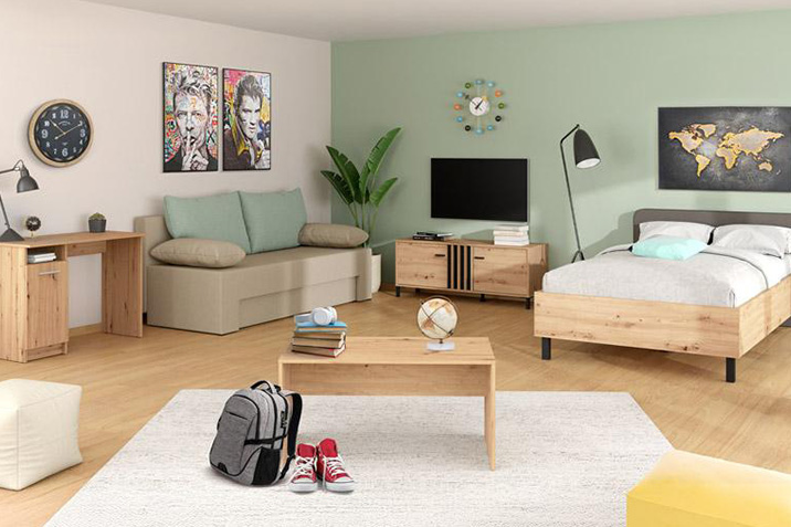 Πολύχρωμο νεανικό δωμάτιο με γραφείο, καναπέ-κρεβάτι και διακόσμηση σε μοντέρνο στυλ.